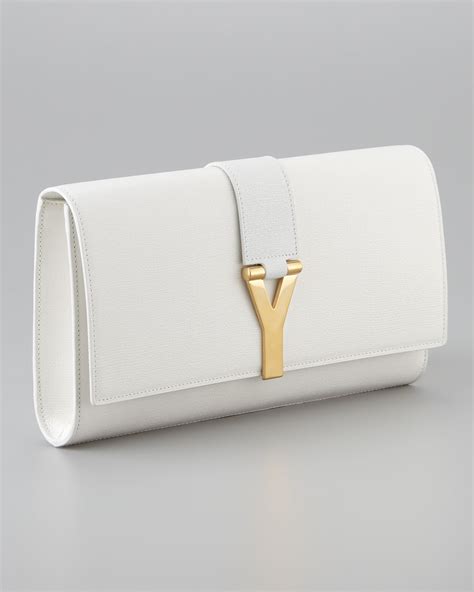 white ysl clutch purse.